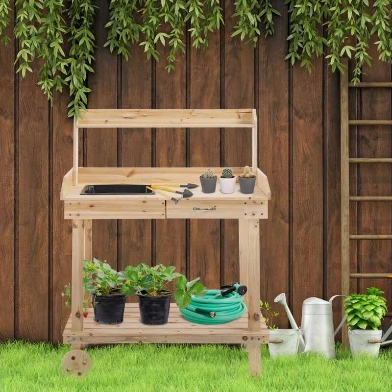 Outsunny Wooden Potting Bench With 2 Removable Wheels & Storage Spaces - Brown - 845-460ND 1 Outsunny Wooden Potting Bench With 2 Removable Wheels & Storage Spaces - Brown - 845-460ND