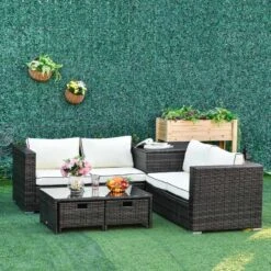 Outsunny 4-Seater Rattan Garden Furniture Set - Table/Storage - Brown - 860-104V70BN -OUTSUNNY Sales Shop o u outsunny 860 104v70bn lifestyle