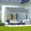 Outsunny Retractable Electric/Manual Awning 4 X 3m - Grey - 840-246V70GY 3 Outsunny Retractable Electric/Manual Awning 4 X 3m - Grey - 840-246V70GY -OUTSUNNY Sales Shop outsunny 840246v70gy lifestyle2